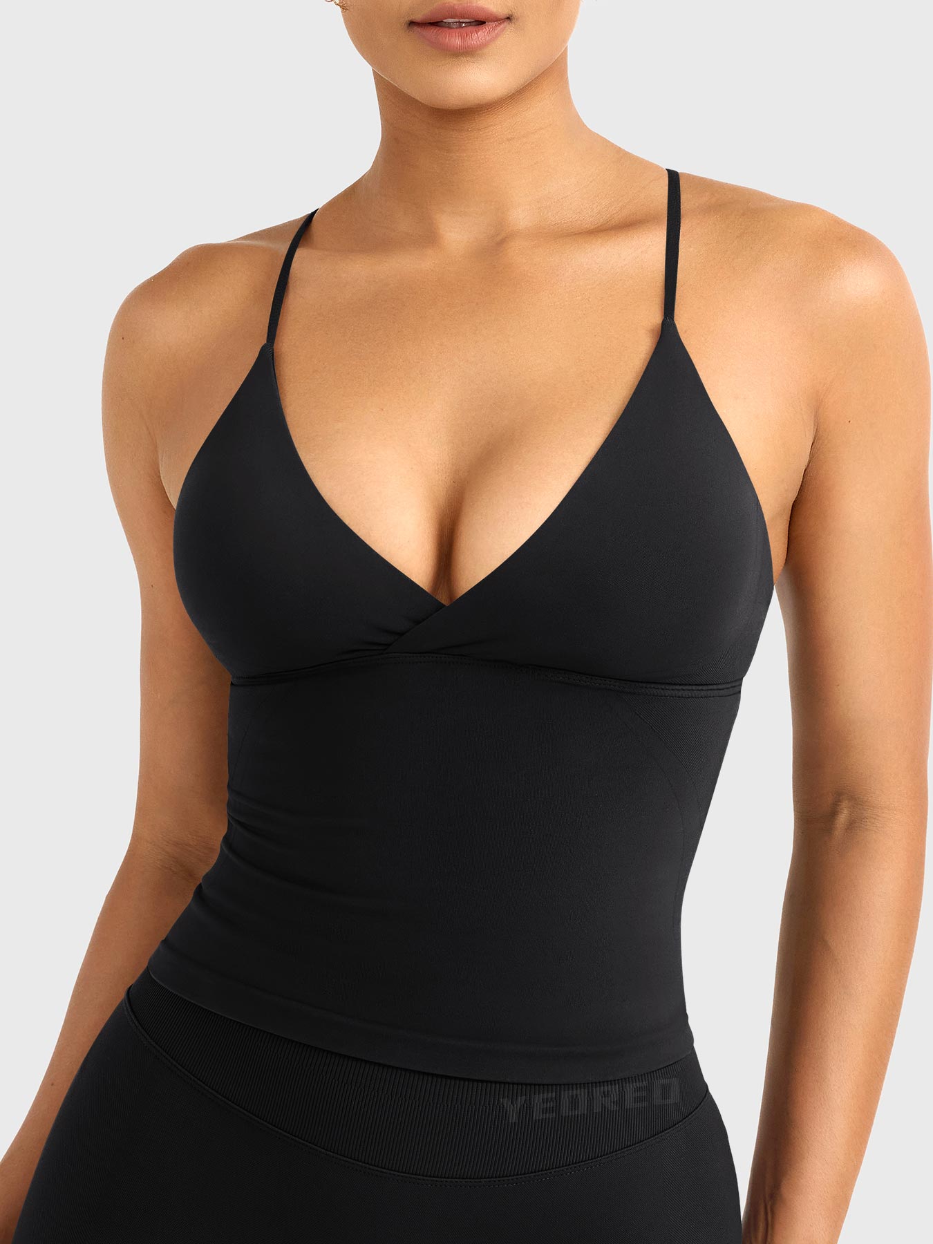 Camiseta sin mangas de corte largo con espalda descubierta