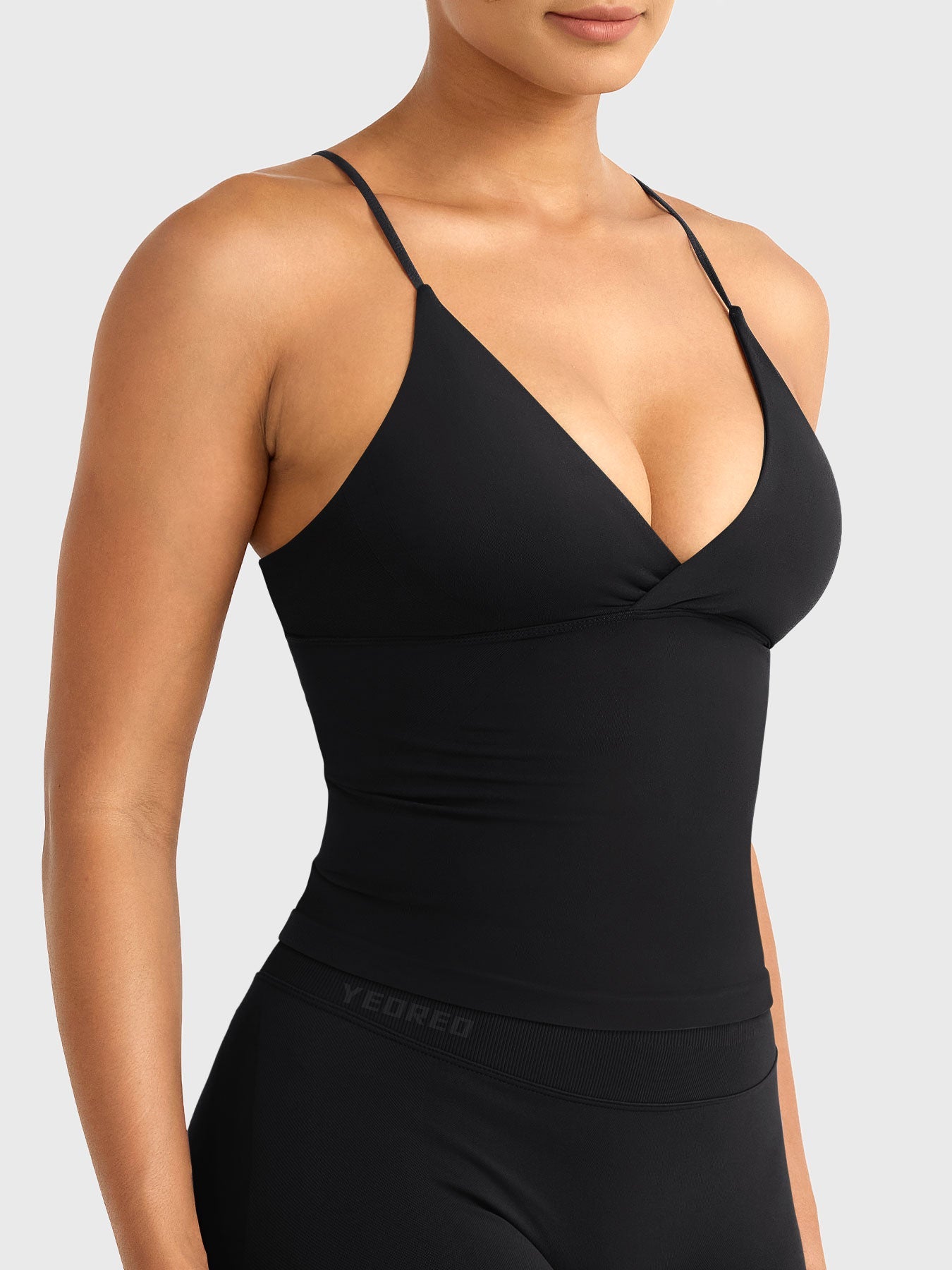 Camiseta sin mangas de corte largo con espalda descubierta