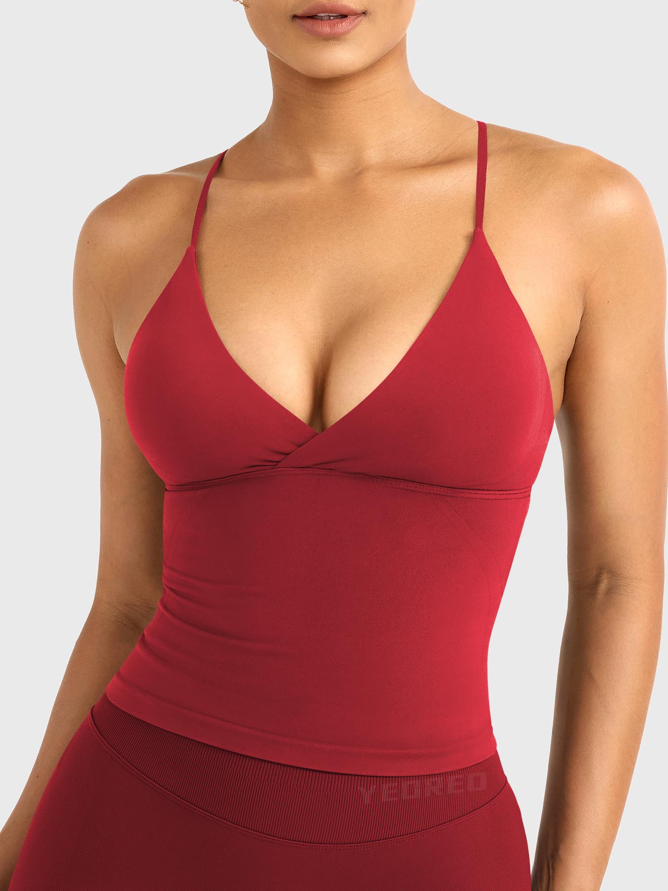 Camiseta sin mangas de corte largo con espalda descubierta